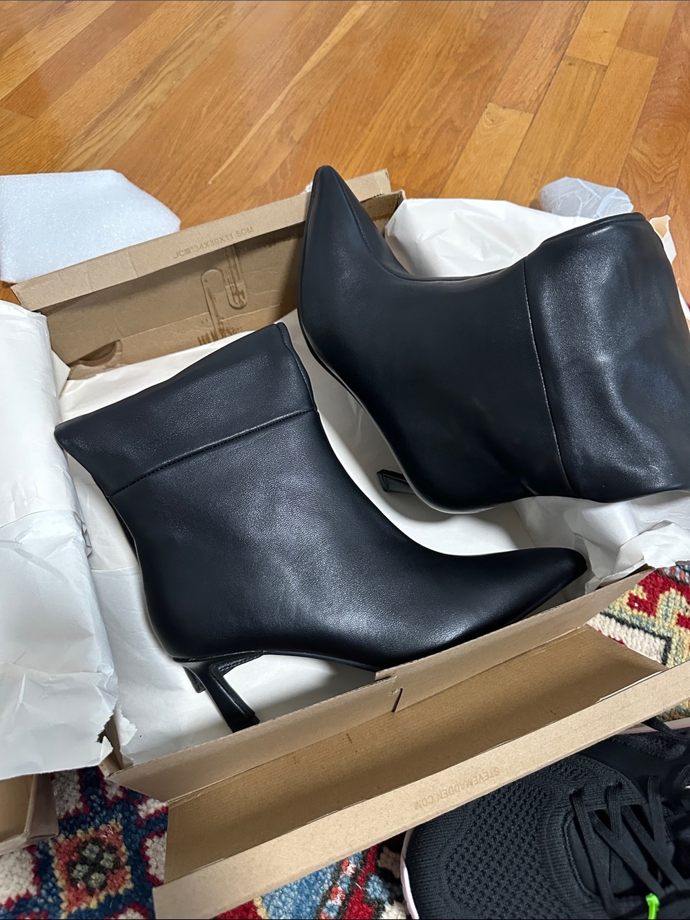 Steve Madden Black Pointed Toe Ankle Booties